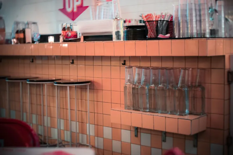 Spin the Stool: The Last Honest Seat at the American Table Is a Vinyl-Covered Swivel